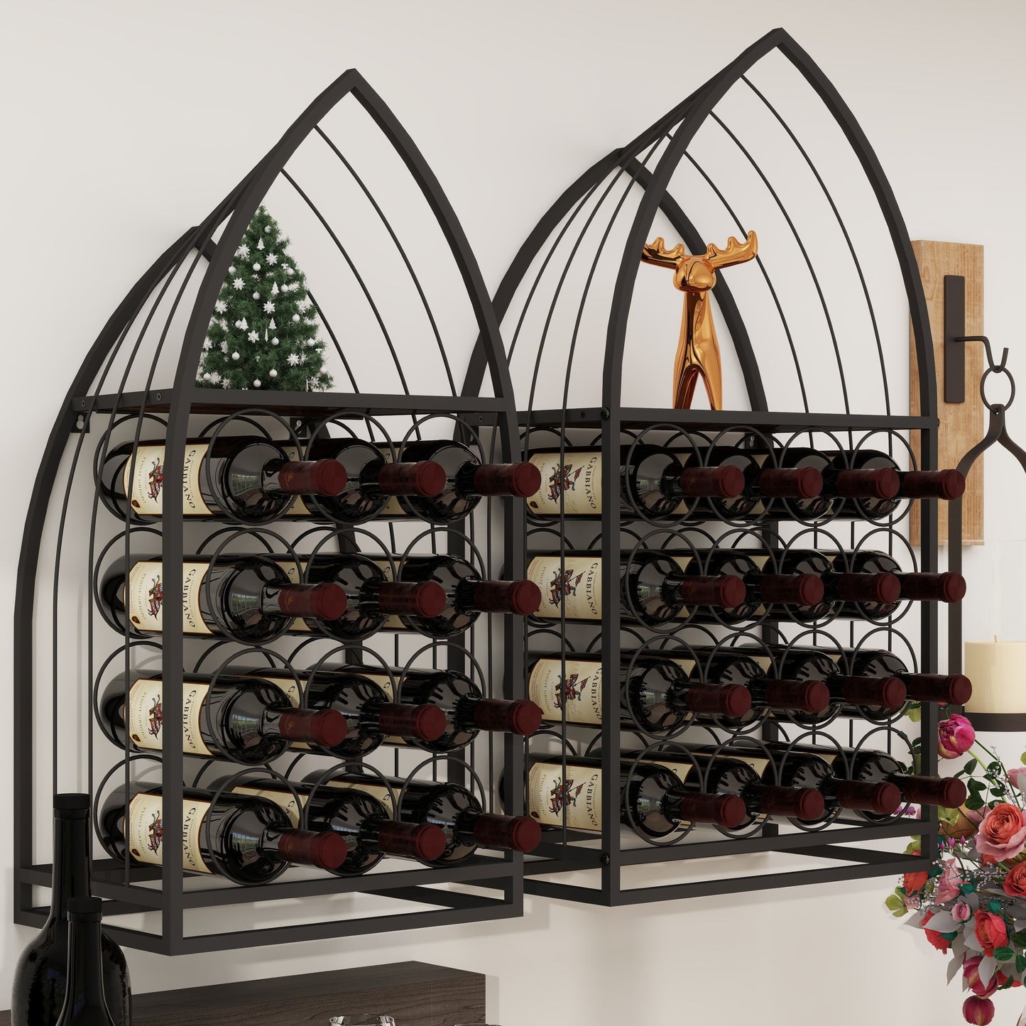 Two black metal sailboat-shaped wine racks mounted on a wall, each holding twelve bottles of wine.